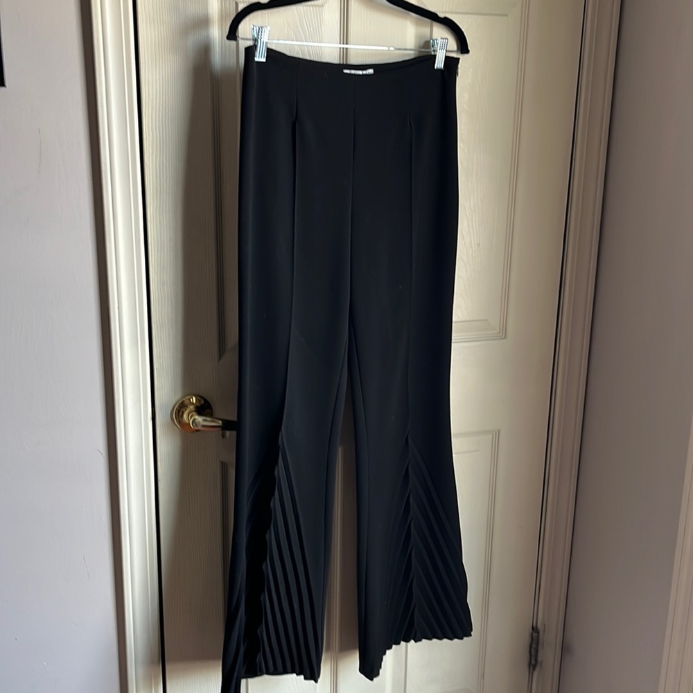 Pleated bell slacks by Alberto Makali